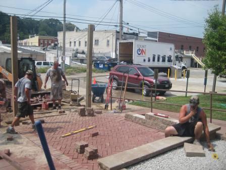 The seat wall is installed and more bricks are added.